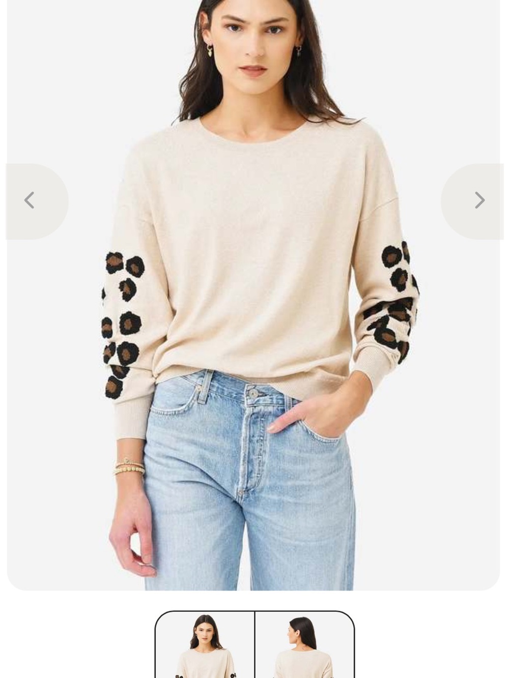 Cream Crewneck Sweater with Leopard Spot Sleeves. Color is “wicker”